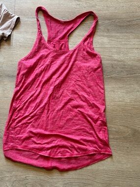Women’s Lululemon Pink Racerback Tank Top see measurements